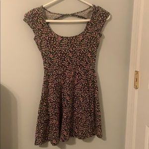Short floral dress with open back